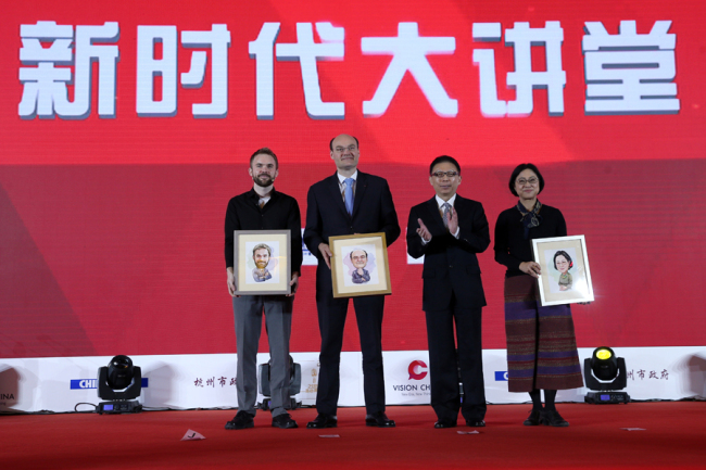Zhou Shuchun (2nd right), publisher and editor-in-chief of China Daily, David Gosset (2nd left), founder of the Europe-China Forum, Lu Li'an (1st right), vice-director of the College of Foreign Languages and Literature at Fudan University, China Daily journalist Greg Fountain attend the second event of Vision China in Hangzhou, Zhejiang Province, April 15, 2018. [Photo: China Daily/Gao Erqiang]