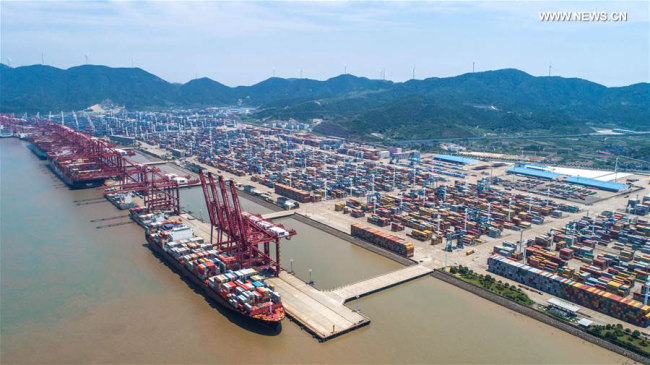 Aerial photo taken on July 12, 2017 shows the container pier of Zhoushan Port in Ningbo City, east China's Zhejiang Province. [Photo: Xinhua]