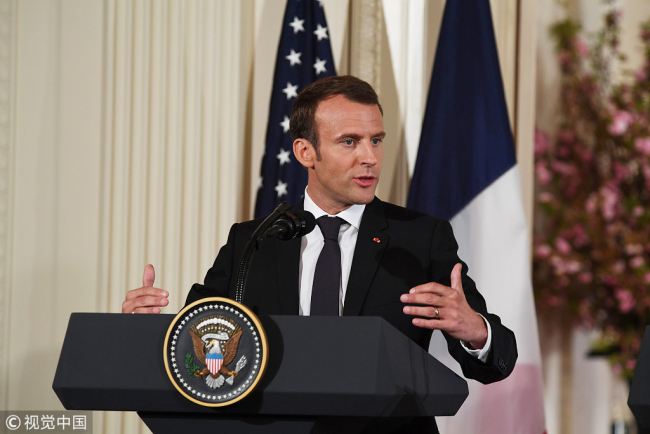 French President Emmanuel Macron speaks during a joint press conference with US President Donald Trump in the East Room of the White House in Washington on Tuesday, April 24, 2018. [Photo: Polaris/Christy Bowe]