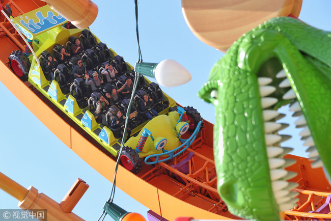 The seventh theme park opens at the Shanghai Disney Resort on Thursday, April 26, 2018. The Pixar Toy Story Land includes Slinky Dog Spin, Rex's Racer, Woody's Roundup, Meeting Post, Toy Box Café and Al's Toy Barn. [Photo: VCG]