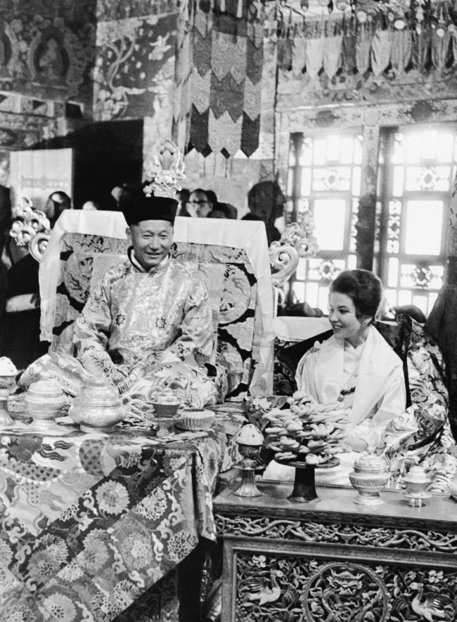 The Crown Prince of Sikkim, Maharajkumar Thondup Namgyal, and his bride, the New York socialite Hope Cooke, during their wedding in the Royal Buddhist Chapel at Gangtok in the Himalayas on March 20, 1963. [File Photo: AP]