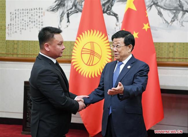 Chinese State Councilor and Minister of Public Security Zhao Kezhi (R) meets with Secretary of the Security Council of Kyrgyzstan Damir Sagynbayev, who is also head of a delegation attending the 13th meeting of Shanghai Cooperation Organization (SCO) Security Council Secretaries, in Beijing, capital of China, May 21, 2018. [Photo: Xinhua]