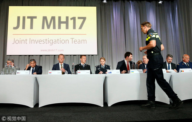 Members of the Joint Investigation Team, comprising the authorities from Australia, Belgium, Malaysia, the Netherlands and Ukraine, present interim results in the ongoing investigation of the 2014 MH17 crash that killed 298 people over eastern Ukraine, during a news conference in Bunnik, Netherlands, May 24, 2018.[Photo: VCG]