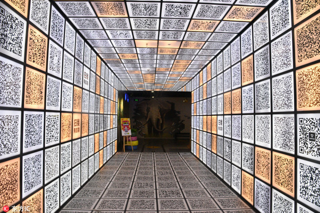 View of a gallery featuring 400 QR codes in a shopping mall in Nanjing city, east China's Jiangsu province, May 9, 2018. [File photo: IC]