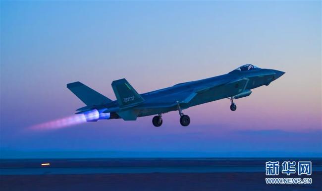 One of China's J-20 stealth fighters during a nighttime exercise. [Photo: Xinhua]