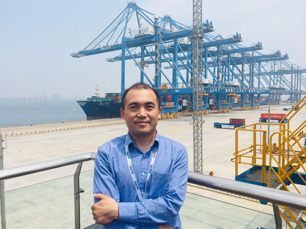 Yang Jiemin, Deputy General Manager of Qingdao New Qianwan Container Terminal, is photographed at the terminal on June 8th, 2018. [Photo: China Plus]