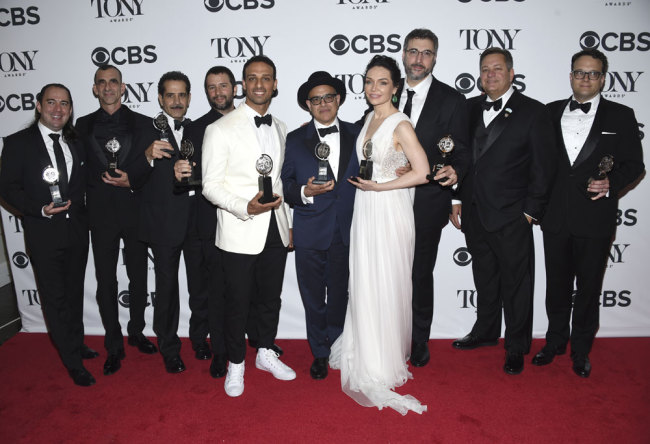 Cast and crew of "The Band's Visit" pose in the press room with the award for best musical at the 72nd annual Tony Awards at Radio City Music Hall on Sunday, June 10, 2018, in New York. [Photo: Invision/AP/Evan Agostini]