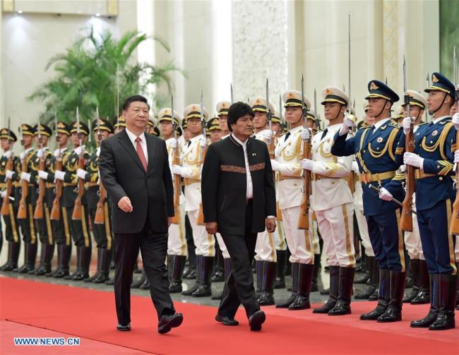 Chinese President Xi Jinping (L) hosts a welcoming ceremony for Bolivian President Juan Evo Morales Ayma at the Great Hall of the People in Beijing, capital of China, June 19, 2018. Xi Jinping held talks with Juan Evo Morales Ayma on Tuesday. [Photo: Xinhua/Yin Bogu]