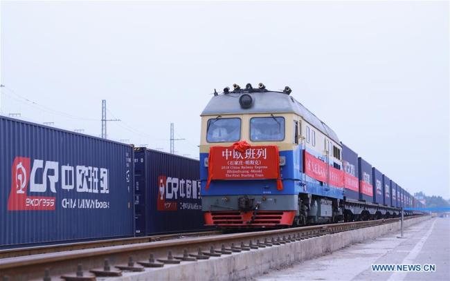 Photo taken on June 2, 2018 shows a China Railway (CR) Express cargo train leaving for Minsk from Shijiazhuang, north China's Hebei Province. The first China-Europe CR Express cargo train from Shijiazhuang to Minsk left on Saturday. [Photo: Xinhua/Liu Peiran]