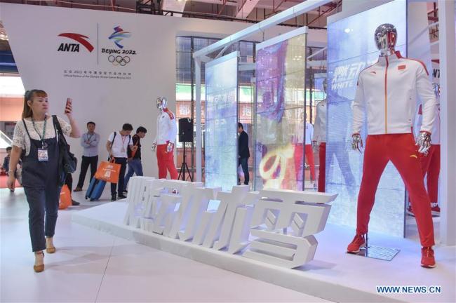 People visit the 20th Jinjiang Footwear & the 3rd Sports Industry International Exposition in Jinjiang, southeast China's Fujian Province, April 19, 2018. Exhibitors from more than 70 countries and regions took part in the expo. [Photo:Xinhua]