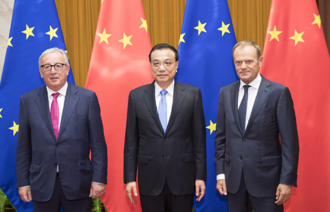 Chinese Premier Li Keqiang, European Council President Donald Tusk, and European Commission President Jean-Claude Juncker co-chair the 20th China-EU leaders' meeting, in Beijing, July 16, 2018. [Photo: Xinhua] 