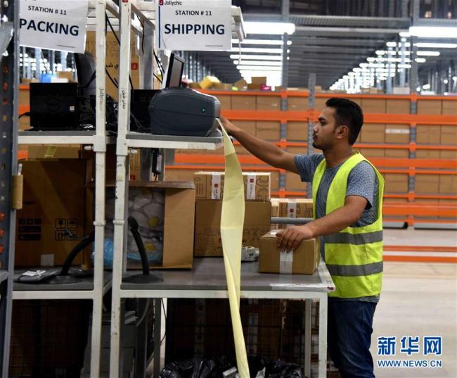 An employee works at a JollyChic warehouse in Riyadh, capital of Saudi Arabia on June 25, 2018. [Photo: Xinhua]