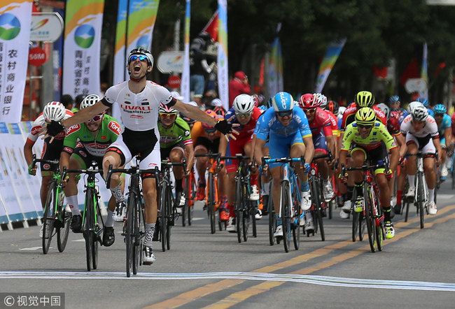 Georgios Bouglas from China's Ningxia Sports Lottery Livall Cycling Team (NLC) wins the first stage of the Tour of Qinghai Lake on Sunday, July 22, 2018.