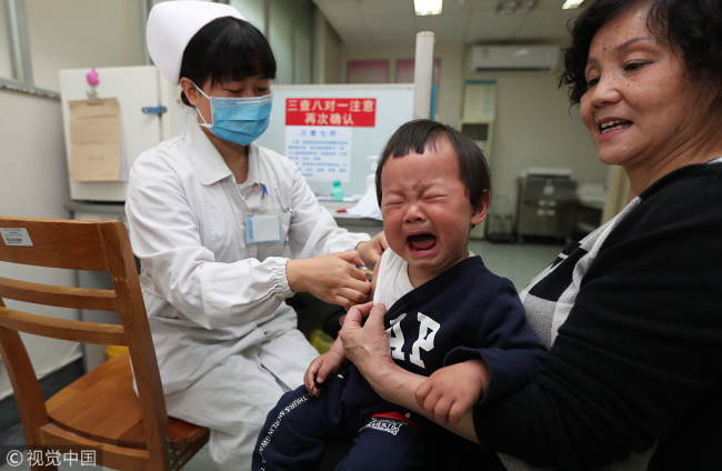 A child is vaccinated in hospital in Southwest China's Kunming on April 25, 2018. [Photo/VCG]