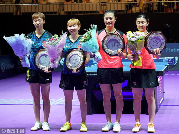 Runner-up Wang Manyu and Zhu Yuling of China and Winner Ding Ning and Chen Meng of China, hold up their winner’s trophy during the award ceremony for the women's doubles finals gold medal match at the International Table Tennis Federation (ITTF) World Tour Platinum Korean Open in Daejeon, 160 kilometers south of Seoul, South Korea, on July 22nd, 2018. Ding Ning/Chen Meng win 3-1.[Photo: VCG]