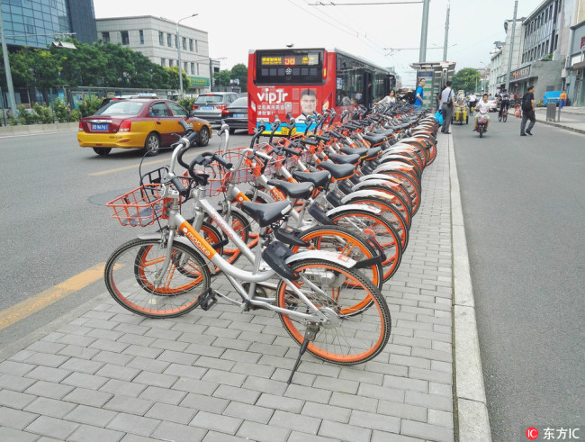 Mobikes parking at designated area,Beijing,Capital of China. [File photo：IC]
