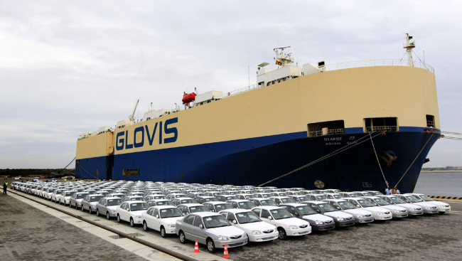 Hyundai cars manufactured in India are parked after being unloaded from the carrier ship Asian Sun at the Chinese built port in Hambantota, Sri Lanka, June 6, 2012. [File Photo: AP/Chamila Karunarathne]