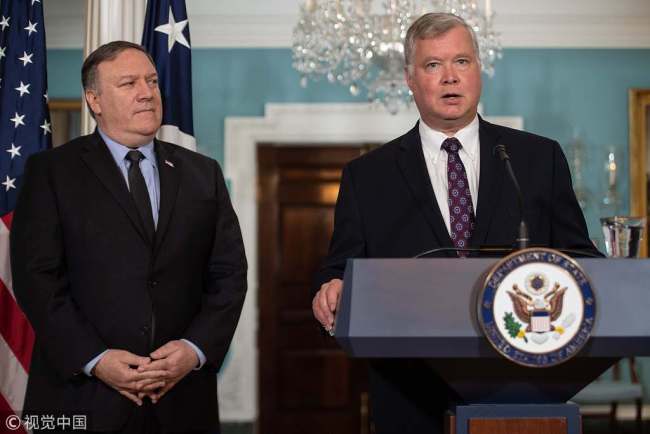 New US special representative to North Korea Steve Biegun speaks after being named by Secretary of State Mike Pompeo (L) at the State Department in Washington, DC, on August 23, 2018. [Photo: VCG]