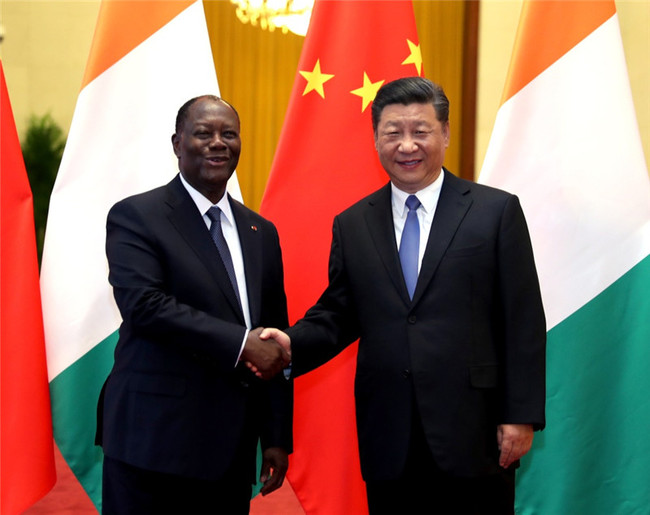 Chinese President Xi Jinping meets with Cote d'Ivoire's President Alassane Ouattara in Beijing on August 30, 2018. [Photo: Xinhua/Ju Peng]