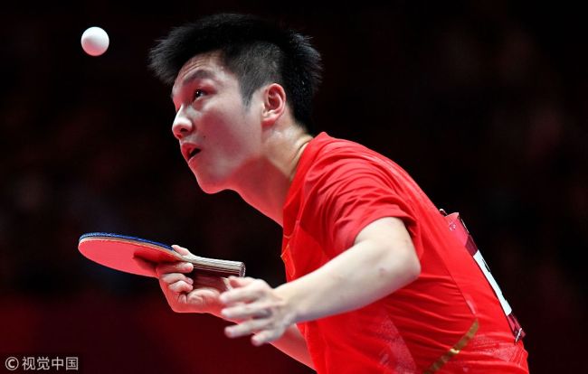 China's Fan Zhendong serves against South Korea's Lee Sang-su during their men's semi-final table tennis match at the Asian Games in Jakarta on September 1, 2018. [Photo: VCG/Juni Kriswanto]