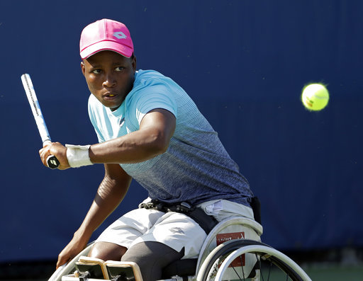 Kgothatso "KG" Montjane returns a shot during a practice session for the wheelchair competition at the U.S. Open tennis tournament, Wednesday, Sept. 5, 2018, in New York. [Photo: AP/Darron Cummings]