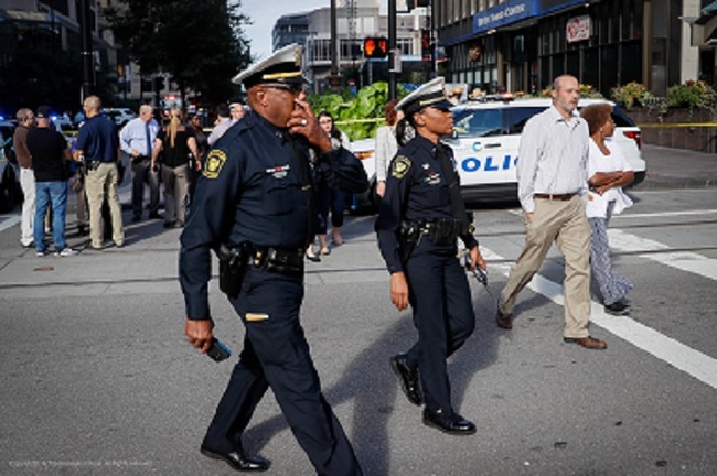 Emergency personnel and police respond to a reported active shooter situation near Fountain Square, Thursday, Sept. 6, 2018, in downtown Cincinnati. [Photo:AP/John Minchillo]