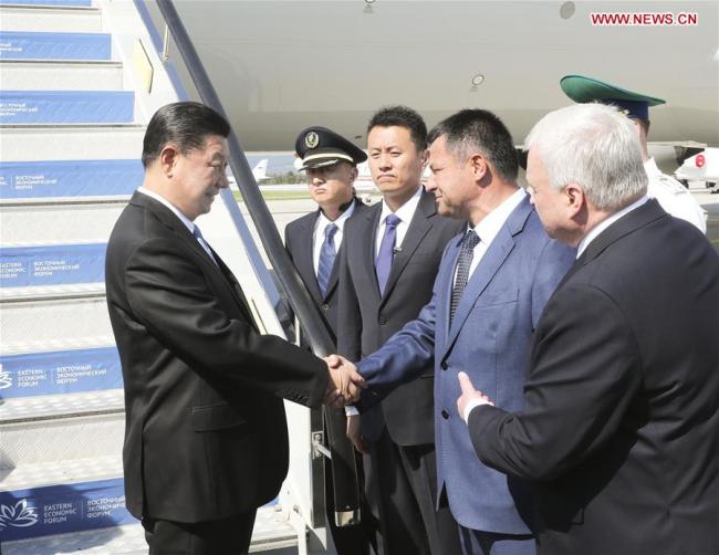 Chinese President Xi Jinping is warmly welcomed by senior Russian officials after he disembarked from the plane upon his arrival in Vladivostok, Russia, Sept. 11, 2018. Xi arrived here Tuesday for the fourth Eastern Economic Forum (EEF) at the invitation of Russian President Vladimir Putin. [Photo: Xinhua]