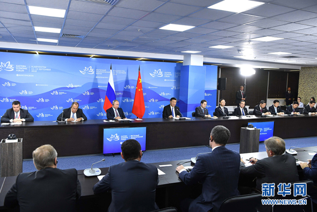 Chinese President Xi Jinping attends a roundtable meeting on regional cooperation between China and Russia of the fourth Eastern Economic Forum in Vladivostok on September 11, 2018. [Photo: Xinhua]