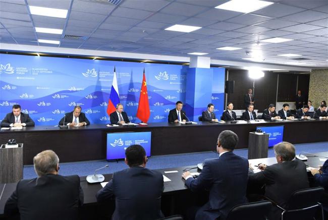 Chinese President Xi Jinping attends a roundtable meeting on regional cooperation between China and Russia of the fourth Eastern Economic Forum in Vladivostok on September 11, 2018. [Photo: Xinhua]