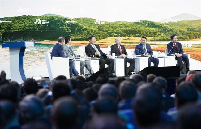 Chinese President Xi Jinping (3rd L, rear) attends the plenary session of the fourth Eastern Economic Forum (EEF), together with Russian President Vladimir Putin, Mongolian President Khaltmaa Battulga, Japanese Prime Minister Shinzo Abe and South Korean Prime Minister Lee Nak-yon, in Vladivostok in Russia's Far East, on Sept. 12, 2018. [Photo: Xinhua]
