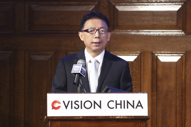 Editor-in-Chief of China Daily Zhou Shuchun addresses China Daily's Vision China event in London, Sept 13, 2018. [Photo by Zou Hong/chinadaily.com.cn]
