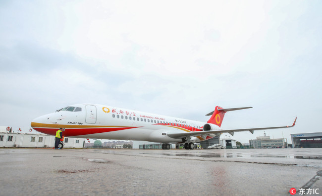 The fourth ARJ21-700 made by the Commercial Aircraft Corp of China (COMAC), the country's first indigenously designed regional jet, is pictured to leave Shanghai for Chengdu Airlines at the Shanghai Dachang Air Base in Shanghai, China, 28 December 2017.[File photo: IC]