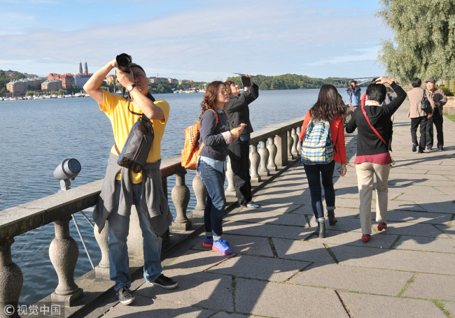 Chinese tourists vist Stockholm, Sweden, August, 31, 2014. [File photo: VCG]