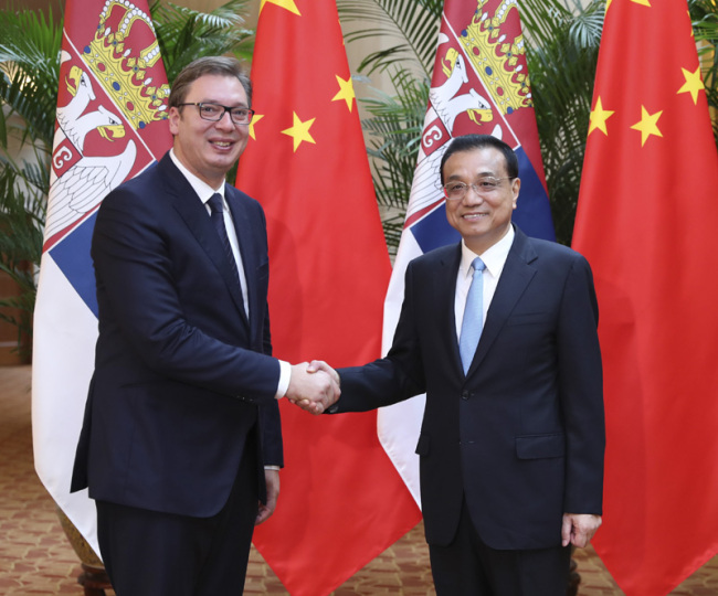Chinese Premier Li Keqiang meets with Serbian President Aleksandar Vucic in Tianjin on September 19, 2018. [Photo: Xinhua]