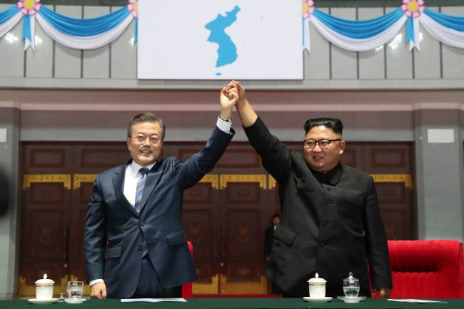 South Korean President Moon Jae-in poses with top leader of the Democratic People's Republic of Korea at the inter-Korean summit in Pyongyang. [Photo credit: Pyongyang Press Corps]