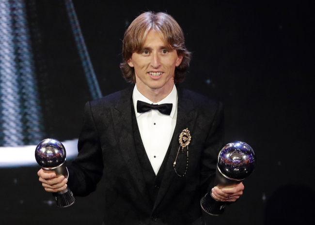 Croatia's Luka Modric receives the Best FIFA Men's Player award during the ceremony of the Best FIFA Football Awards in the Royal Festival Hall in London, Britain, Monday, Sept. 24, 2018. [Photo: AP/Frank Augstein]