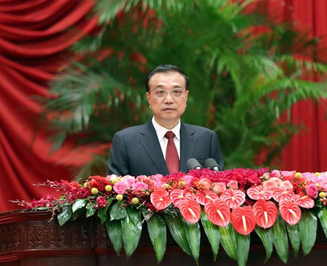 Chinese Premier Li Keqiang addresses a reception celebrating the 69th anniversary of the founding of the People's Republic of China in Beijing, capital of China, on Sept. 30, 2018. [Photo: Xinhua/Liu Weibing]