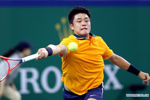 China's Wu Yibing hits a return during the men's singles second round match against Japan's Kei Nishikori at the Shanghai Masters tennis tournament on October 10, 2018. Wu Yibing lost 1-2. [Photo: Xinhua/Fan Jun]