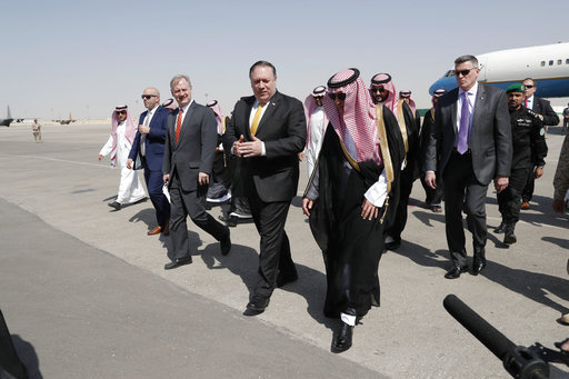 U.S. Secretary of State Mike Pompeo, centre, walks with Saudi Foreign Minister Adel al-Jubeir, after arriving in Riyadh, Saudi Arabia, Tuesday Oct. 16, 2018. [Photo: AP]