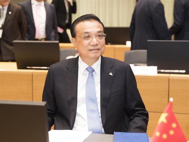 Chinese Premier Li Keqiang addresses the 12th Asia-Europe Meeting (ASEM) Summit in Brussels, Belgium, Oct. 19, 2018. [Photo: Xinhua/Huang Jingwen]