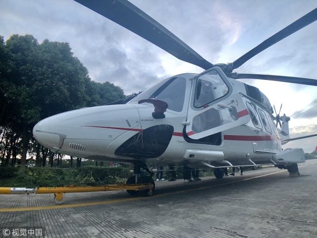 An AW189 helicopter manufactured by Italy's Leonardo lands in Shanghai, October 20, 2018. The helicopter will be exhibited at the upcoming China International Import Expo. [Photo: VCG]