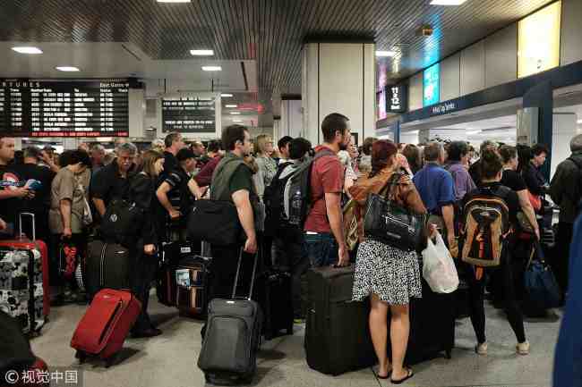 May 18, 2015: Passengers wait for an Amtrak train as normal service returned between New York City and Philadelphia in New York City. [Photo: VCG]