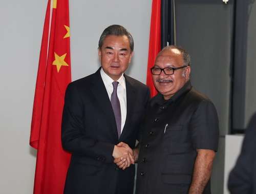 Chinese State Councilor and Foreign Minister Wang Yi meets PNG Prime Minister Peter O'Neill in Port Moresby on October 31, 2018. [Photo: fmprc.gov.cn]