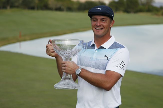 Bryson DeChambeau holds the trophy after winning the Shriners Hospitals for Children Open golf tournament at the TPC Summerlin, Sunday, Nov. 4, 2018, in Las Vegas. [Photo: AP]