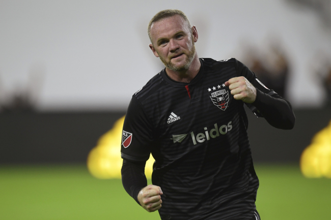 D.C. United forward Wayne Rooney celebrates his first MLS goal during the first half of a soccer match against the Colorado Rapids in Washington, Saturday, July 28, 2018. [Photo: AP]