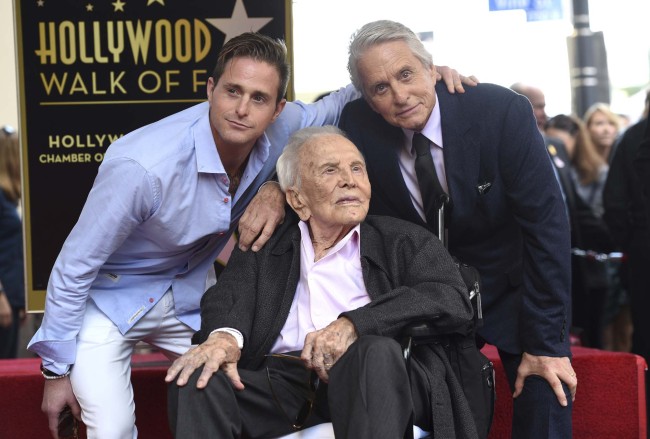 Honoree and actor Michael Douglas, from right, poses with his father actor Kirk Douglas and his son actor Cameron Douglas following a ceremony honoring him with a star on the Hollywood Walk of Fame on Tuesday, Nov. 6, 2018, in Los Angeles. [Photo: AP]