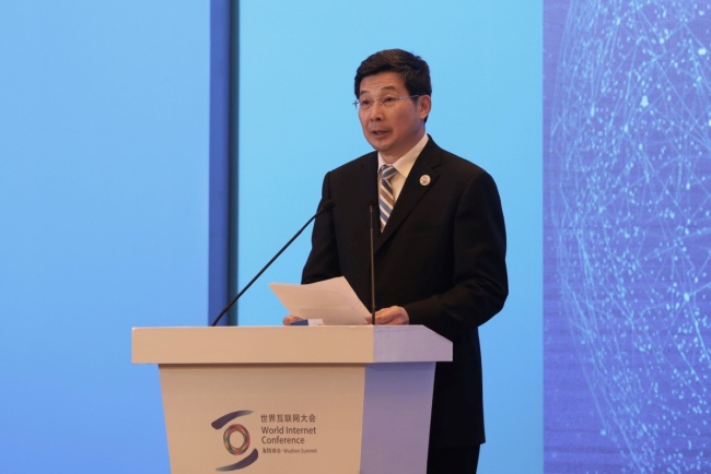 Zhuang Rongwen, minister of Cyberspace Administration of China, delivers a speech at a ministerial forum themed "Bridging the Digital Divide" in Wuzhen, East China’s Zhejiang province on Nov 8, which serves as a sub-forum of the fifth World Internet Conference. [Photo:Chinadaily]