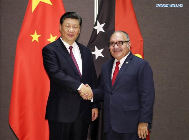 Chinese President Xi Jinping (L) holds talks with Papua New Guinea (PNG) Prime Minister Peter O'Neill in Port Moresby, PNG, on Nov. 16, 2018. [Photo: Xinhua/Ding Lin]