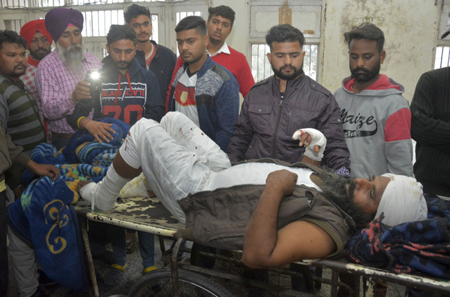 A man injured in a blast at Nirankari Bhawan, a prayer hall in nearby Adliwal village receives treatment at a hospital in Amritsar, India, Sunday, Nov.18, 2018. [Photo: AP]