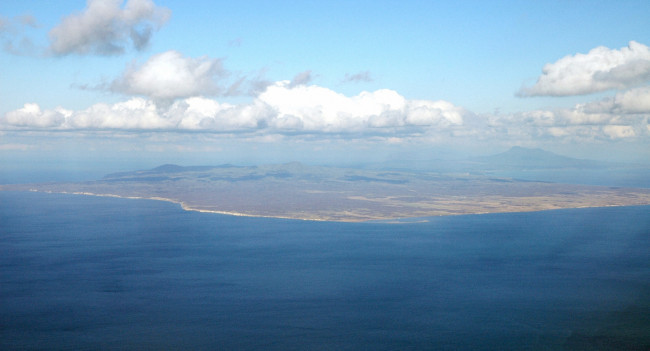 Photo shows an aerial image taken in 2005 of Kunashiri Island, one of four Russian-administered islands off Hokkaido claimed by Japan. The islands are referred to as the Northern Territories by Japan and the Southern Kurils by Russia. [Photo: IC]